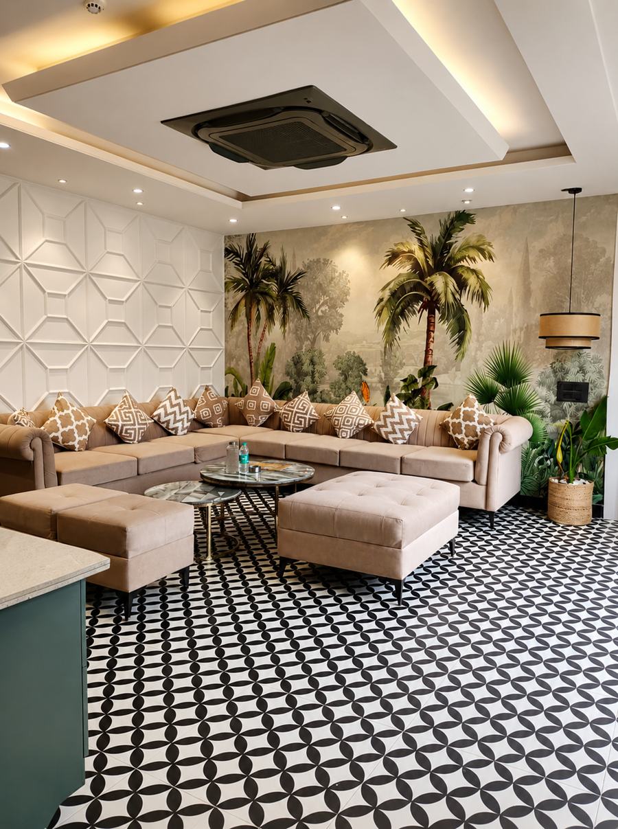 Lounge with a palm mural, sectional sofa and patterned floor